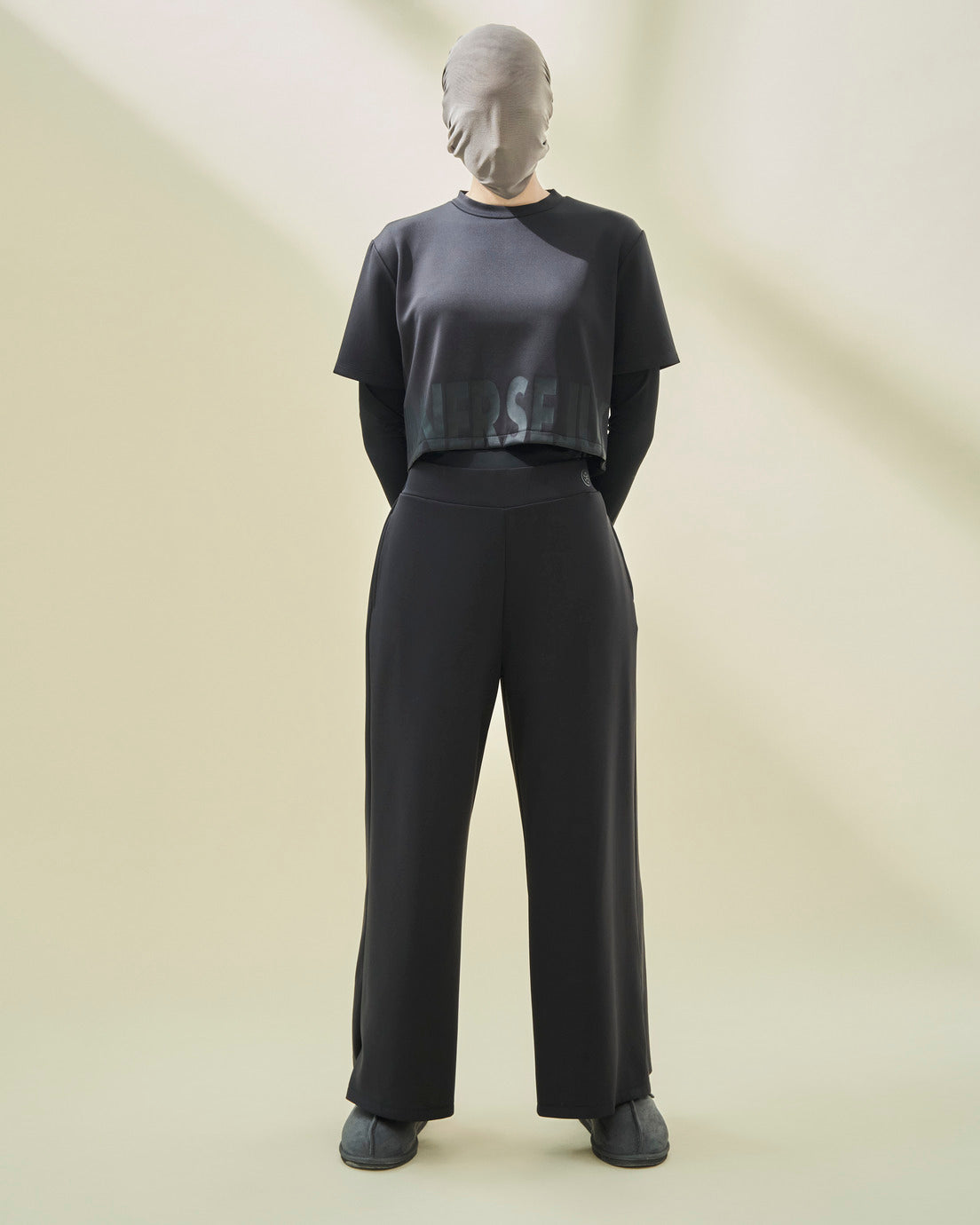 THE LOGOMANIA 2-IN-1 CROP TOP IN BLACK