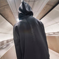 THE REVERSE RELAXED HOODIE  IN BLACK